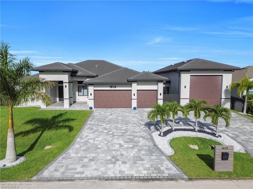 1612 NW 37th AVE CAPE CORAL, FL 33993
