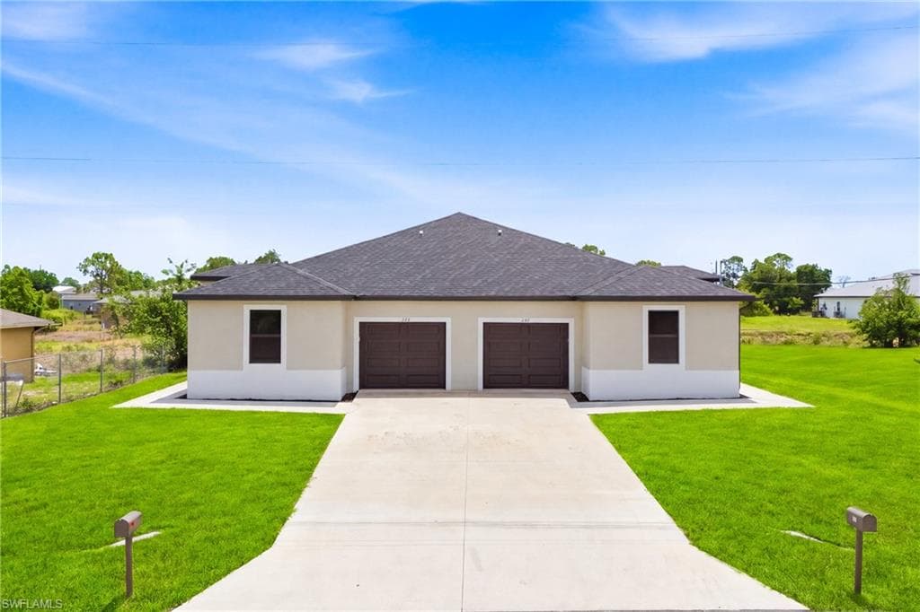 225/227 Hightower AVE S LEHIGH ACRES, FL 33973