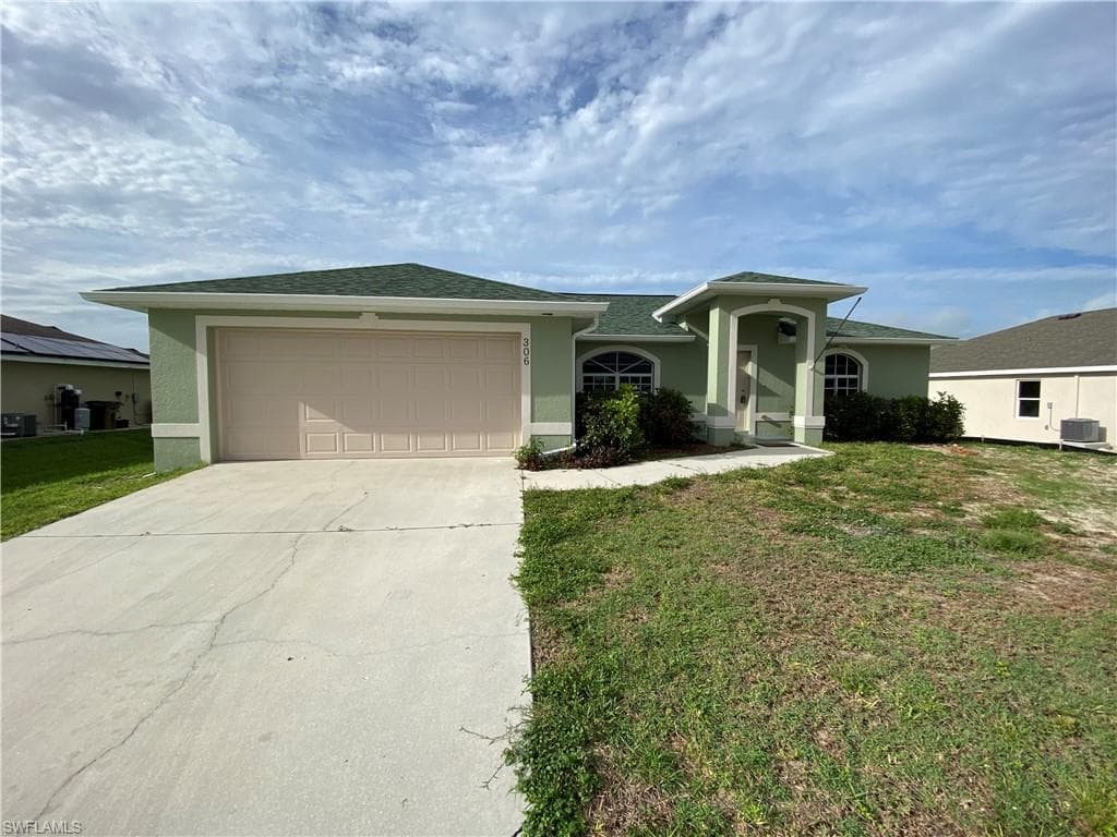 306 NE 14th TER CAPE CORAL, FL 33909