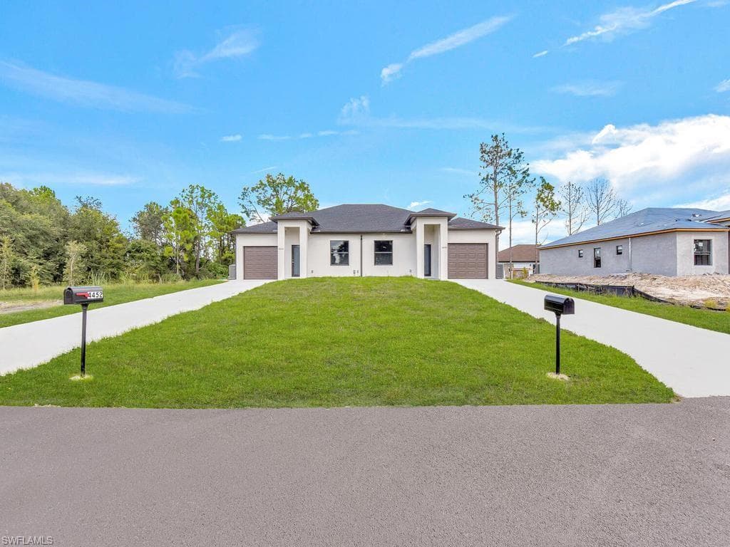 4709/4711 21 ST SW LEHIGH ACRES, FL 33973