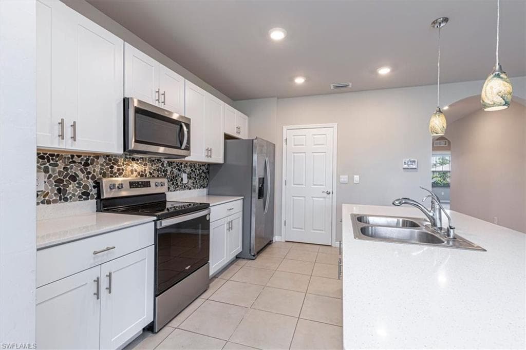 1806 NW 21st TER CAPE CORAL, FL 33993