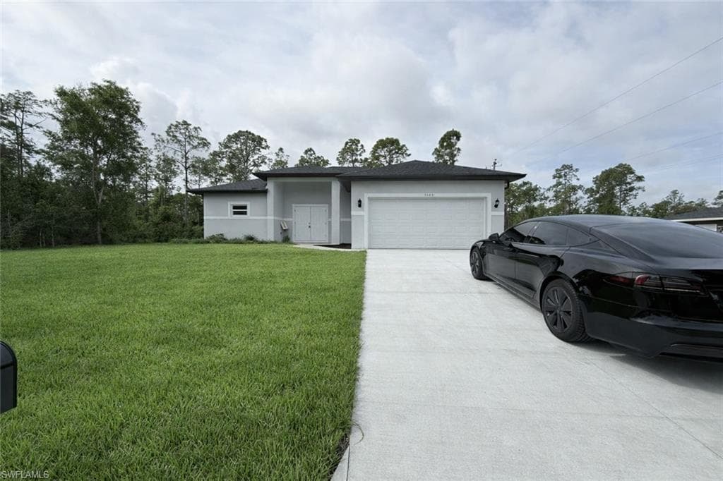 1103 W 10th ST LEHIGH ACRES, FL 33972