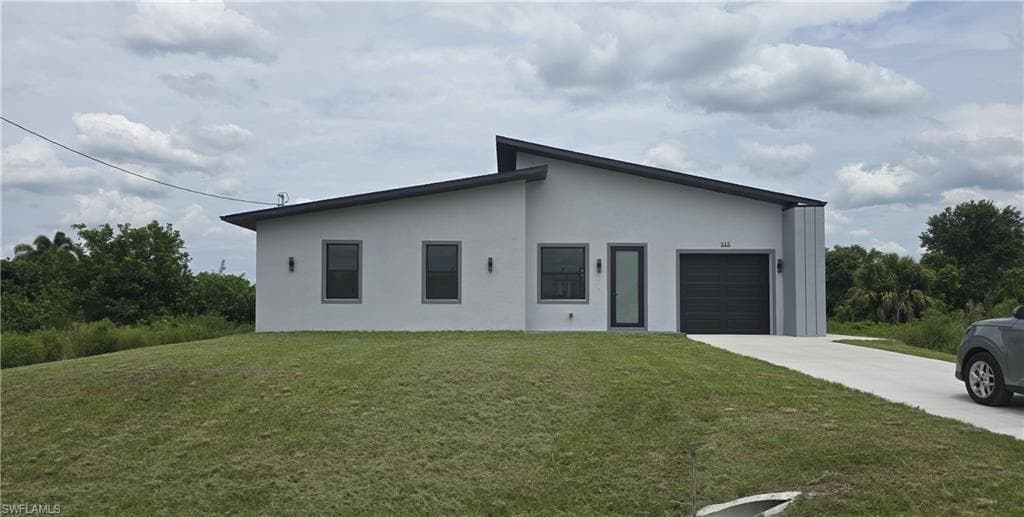 515 CROYDON AVE S LEHIGH ACRES, FL 33974