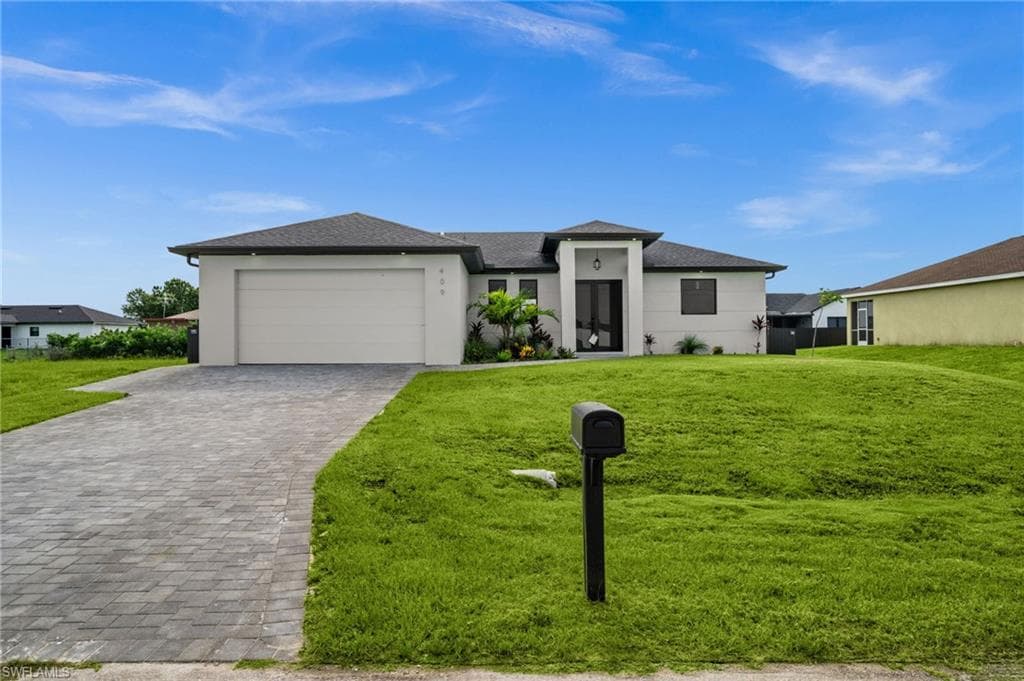 409 25TH PL CAPE CORAL, FL 33993