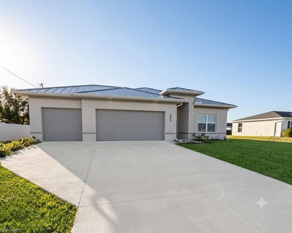 3082 NW 4th AVE CAPE CORAL, FL 33993