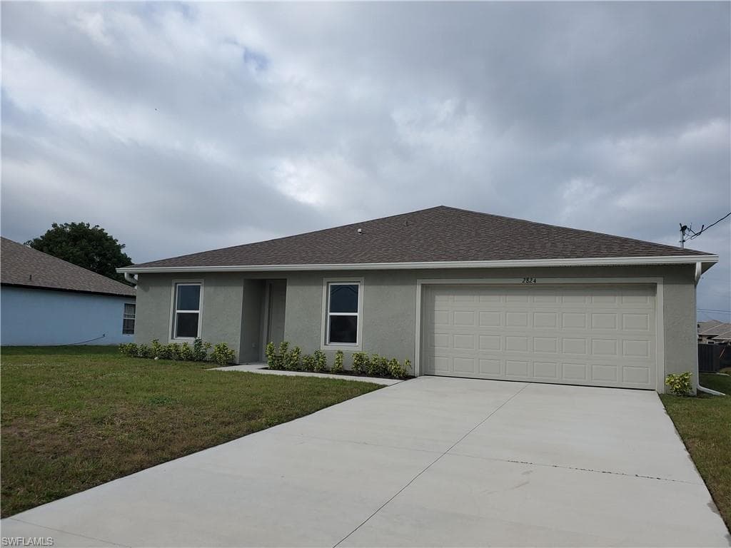 2824 NE 3rd AVE CAPE CORAL, FL 33909