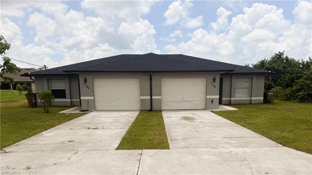 1129/1131 Ivan AVE S LEHIGH ACRES, FL 33973