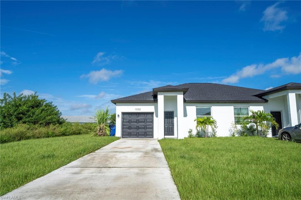1530 Gilbert Ave S LEHIGH ACRES, FL 33973
