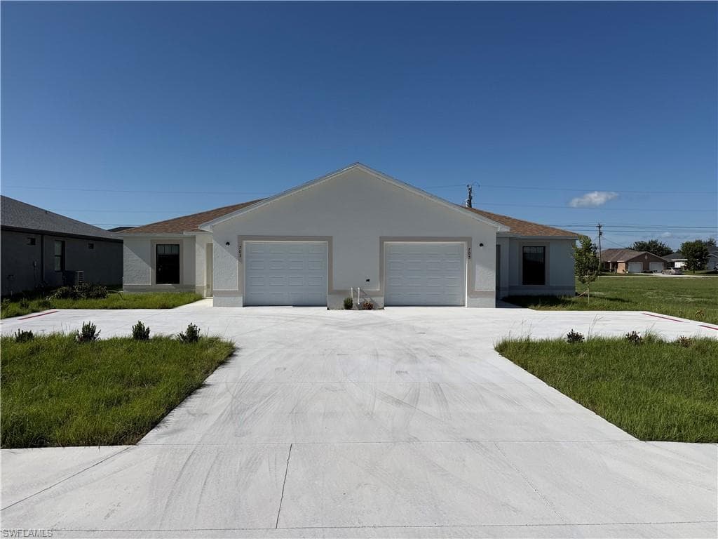 703 SE 8th ST CAPE CORAL, FL 33990