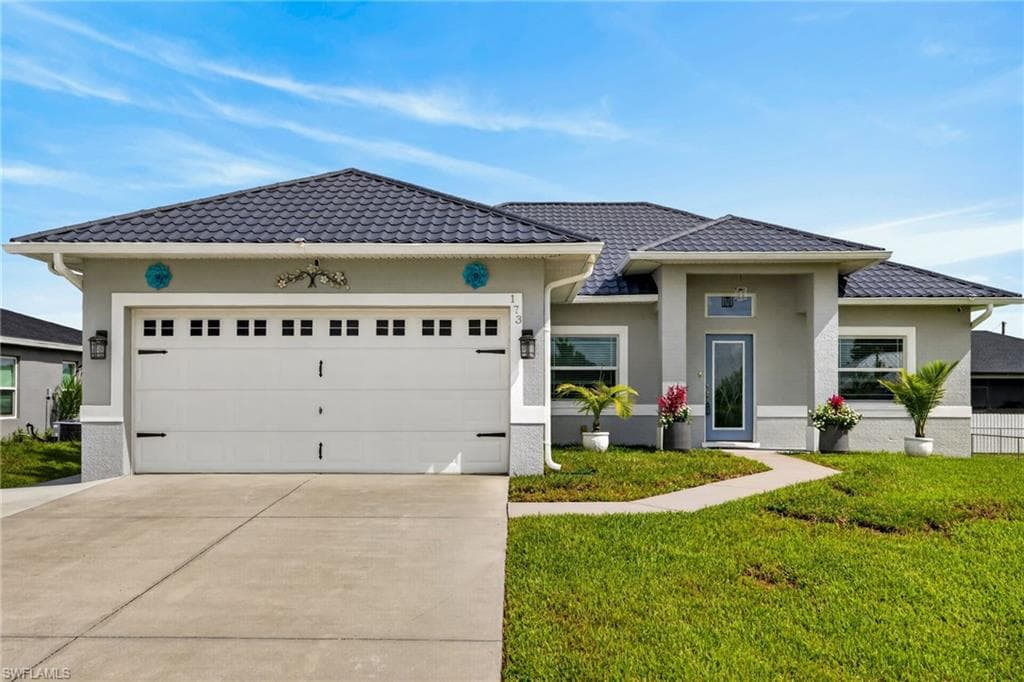 173 Peerless ST LEHIGH ACRES, FL 33974