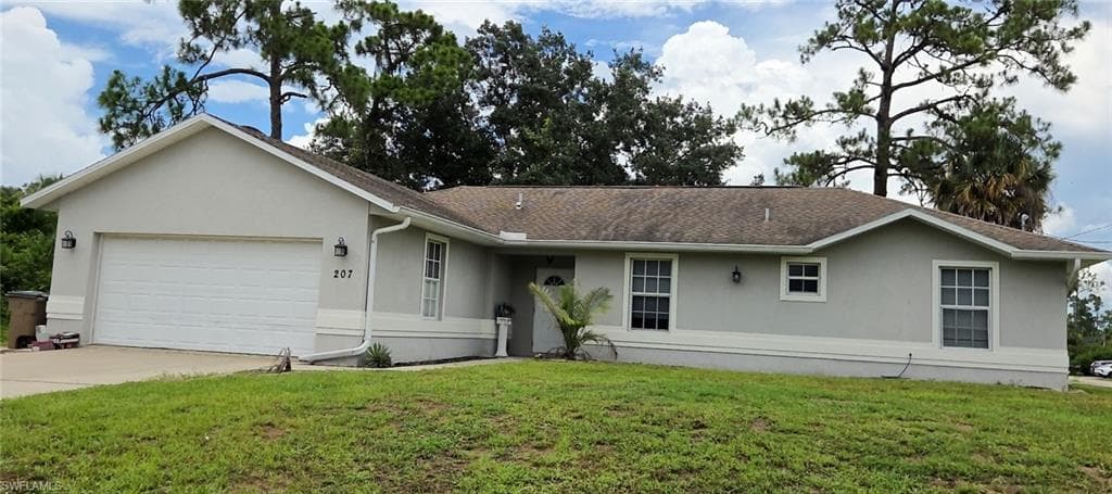 207 E 8th ST LEHIGH ACRES, FL 33972
