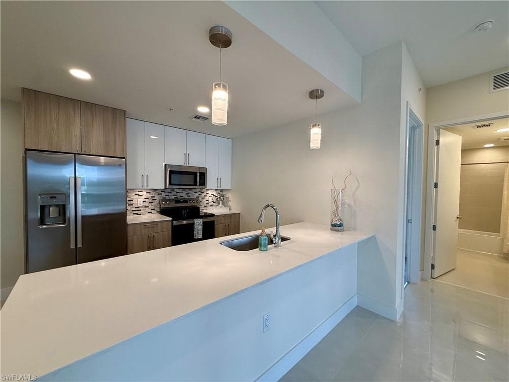 26589 Rosewood Pointe DR A-203 BONITA SPRINGS, FL 34135