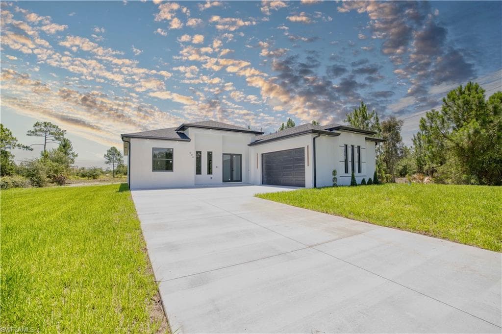 906 Greenwood AVE W LEHIGH ACRES, FL 33972