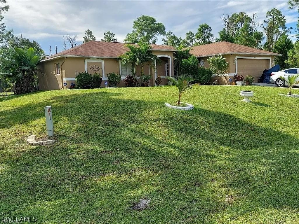 764 Chapman AVE S LEHIGH ACRES, FL 33974