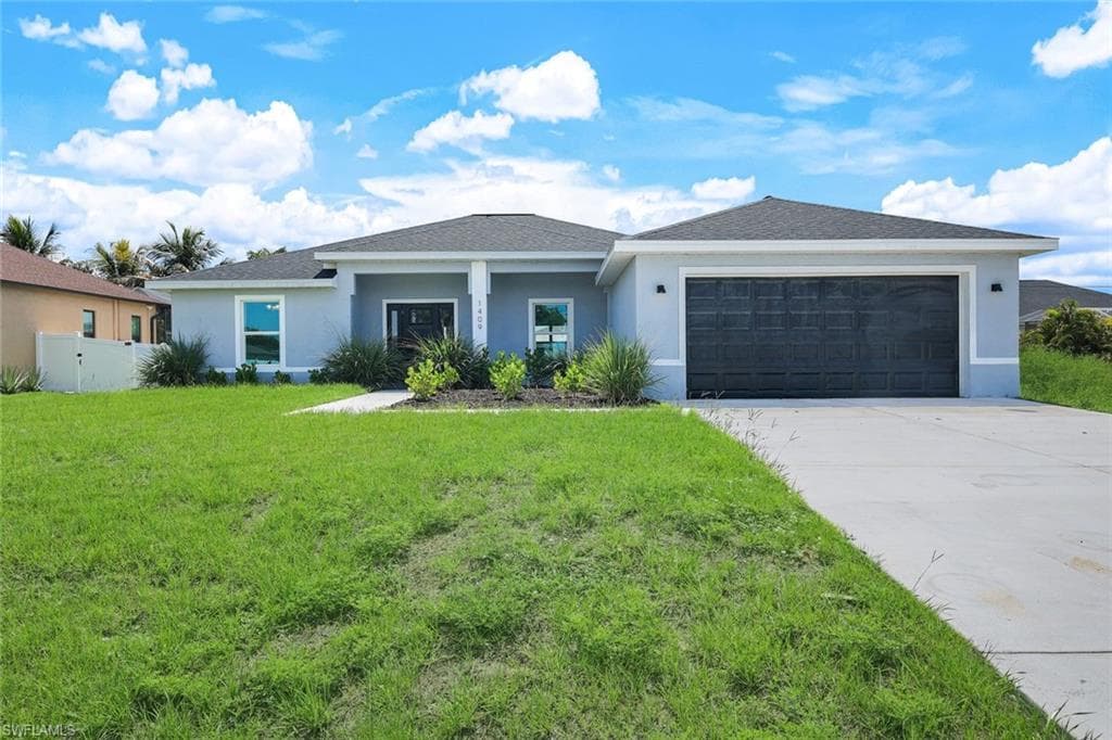 1409 NE 18th PL CAPE CORAL, FL 33909