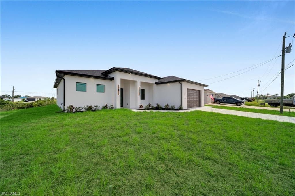 216 NE 25th TER CAPE CORAL, FL 33909