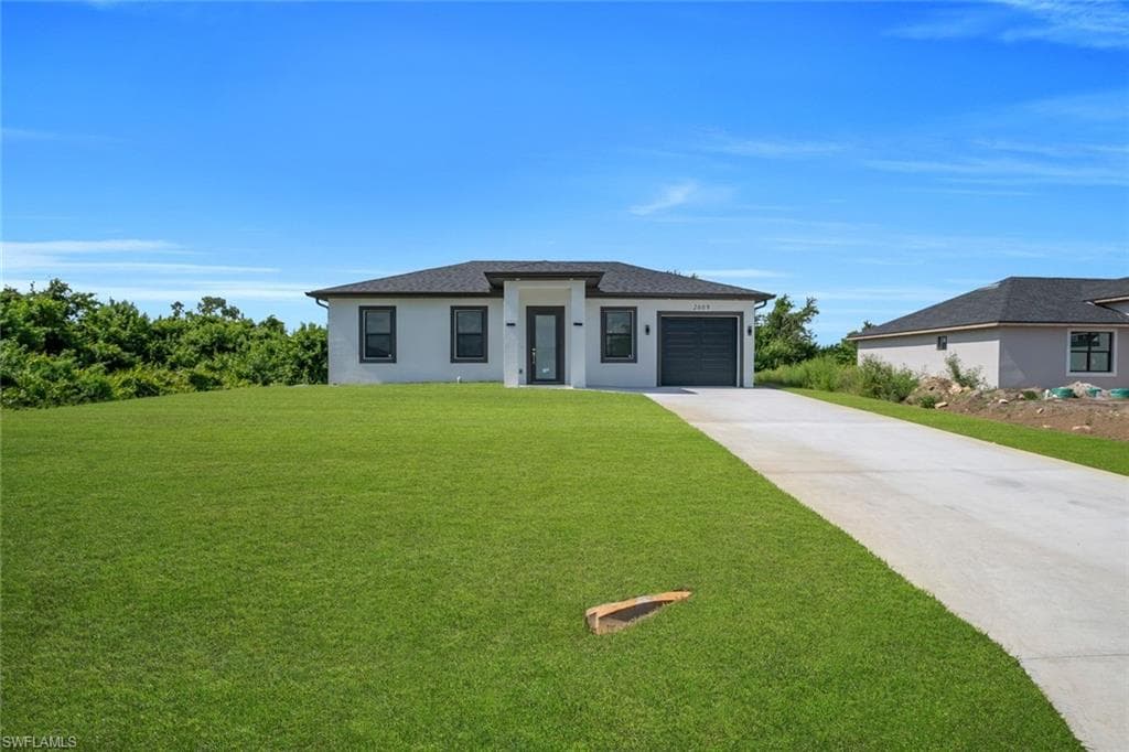 2609 21st ST SW LEHIGH ACRES, FL 33976