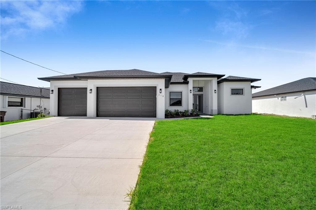 318 NW 9th ST CAPE CORAL, FL 33993