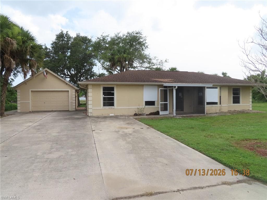 602 Harrison DR LEHIGH ACRES, FL 33936
