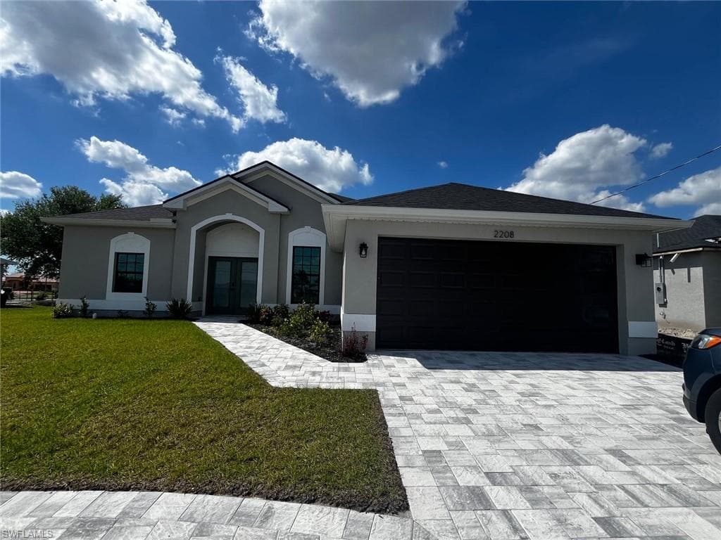 2208 Nelson RD N CAPE CORAL, FL 33993