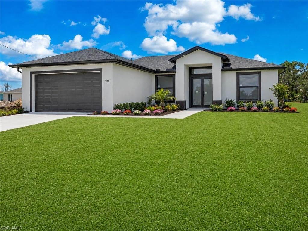 208 PEMBROKE ST LEHIGH ACRES, FL 33974