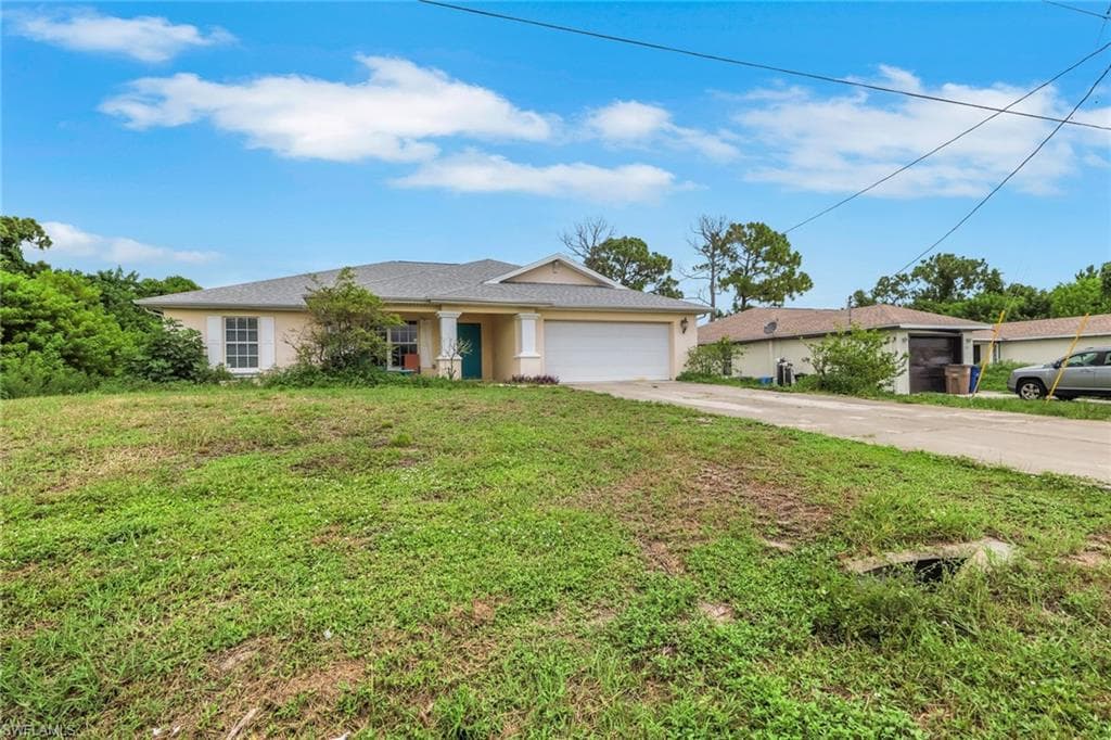 277 Grant BLVD LEHIGH ACRES, FL 33974