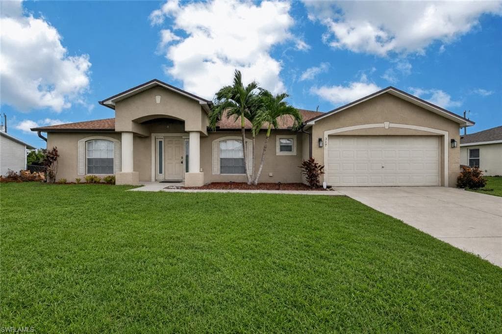 317 NE 9th TER CAPE CORAL, FL 33909