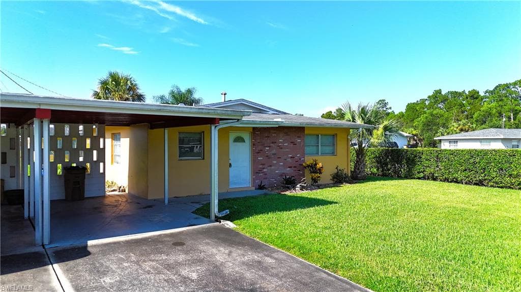 2214 E 6th ST LEHIGH ACRES, FL 33936