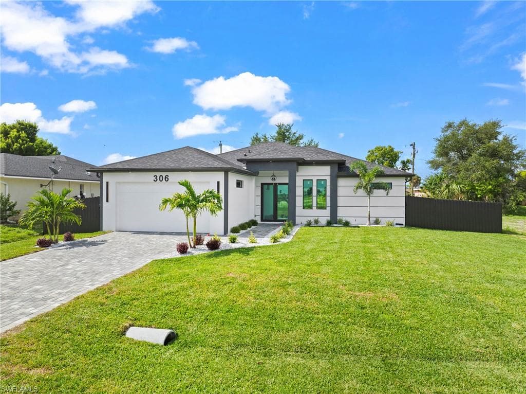 306 NE 11th ST CAPE CORAL, FL 33909