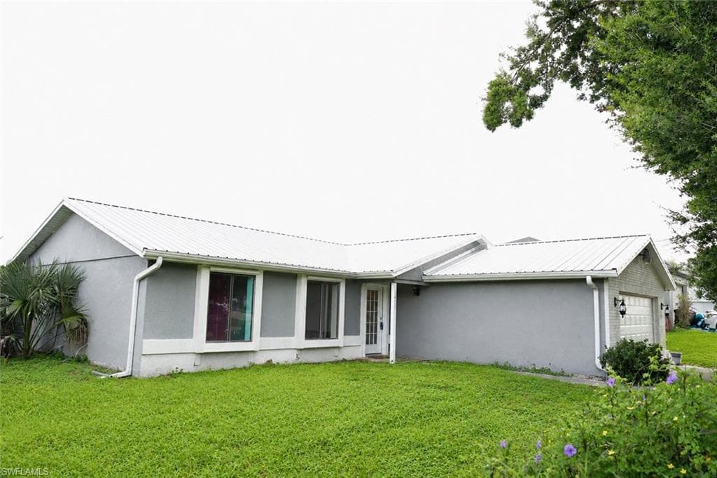 3414 22nd ST SW LEHIGH ACRES, FL 33976