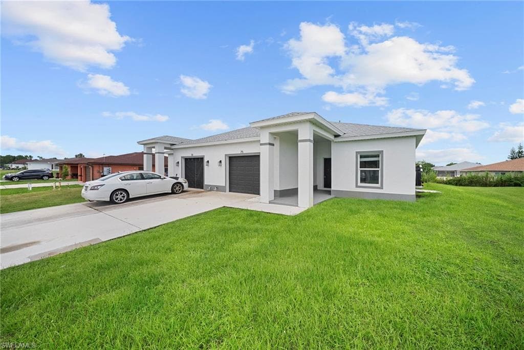 715 homer AVE S LEHIGH ACRES, FL 33973