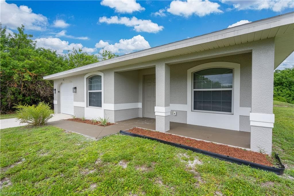 546 Sherwood AVE S LEHIGH ACRES, FL 33974