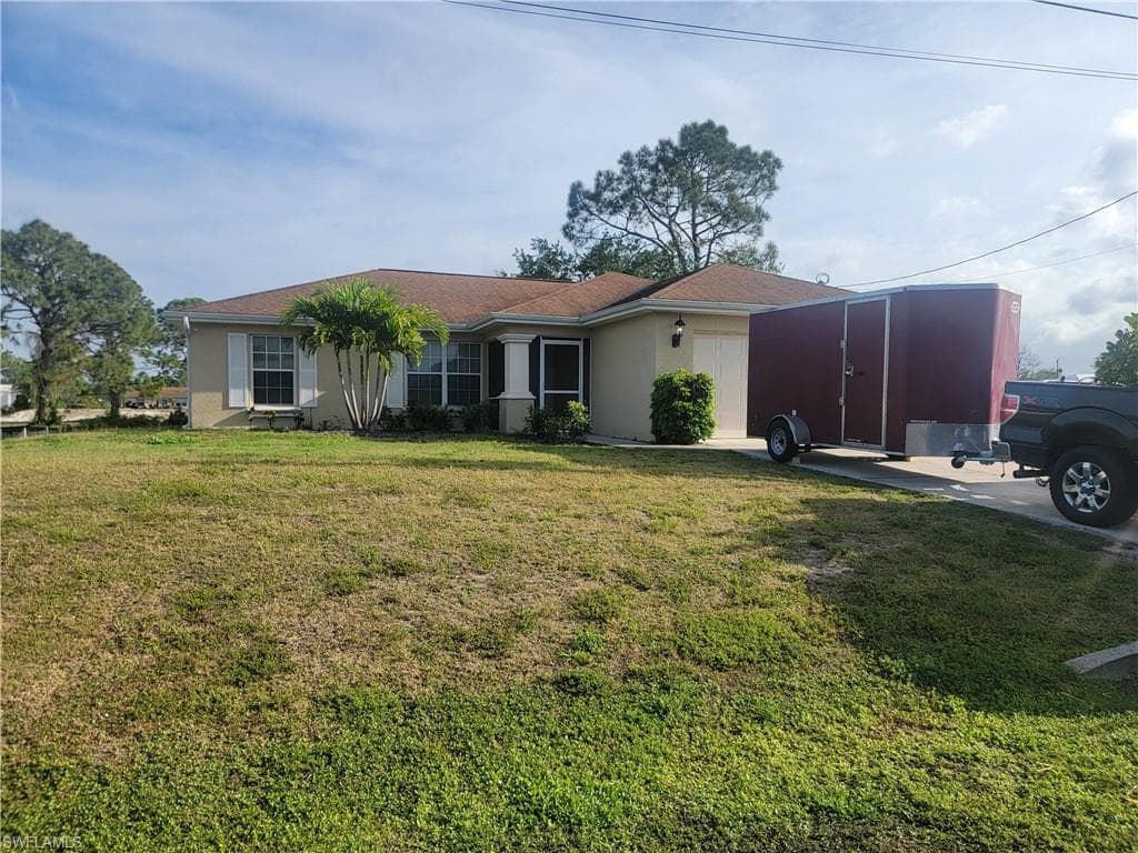 3802 11th ST SW LEHIGH ACRES, FL 33976
