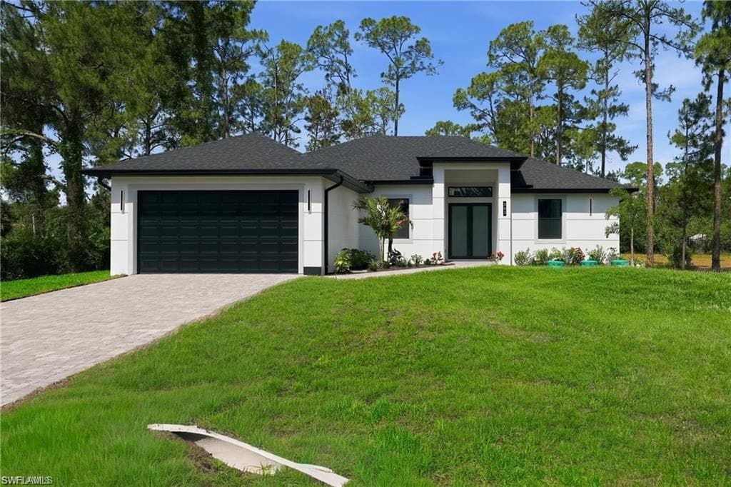 303 McArthur AVE LEHIGH ACRES, FL 33936