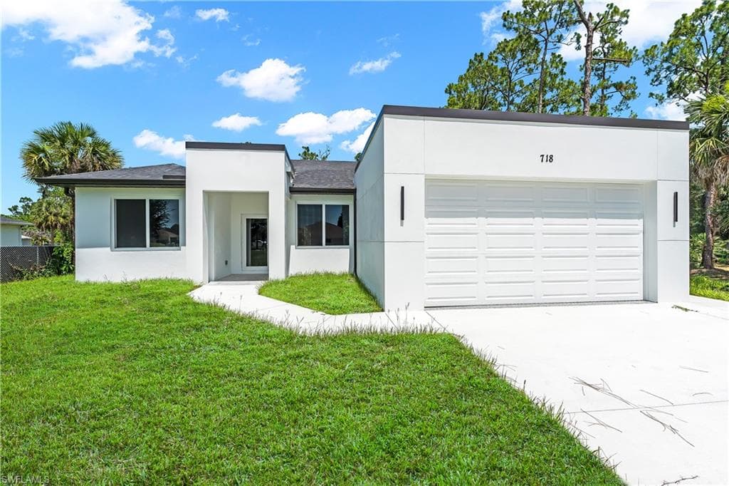 718 Robert AVE LEHIGH ACRES, FL 33936