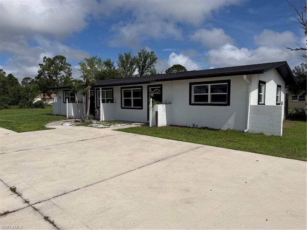 703 Joel BLVD LEHIGH ACRES, FL 33936