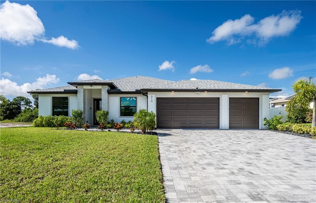 310 NW 14th ST CAPE CORAL, FL 33993