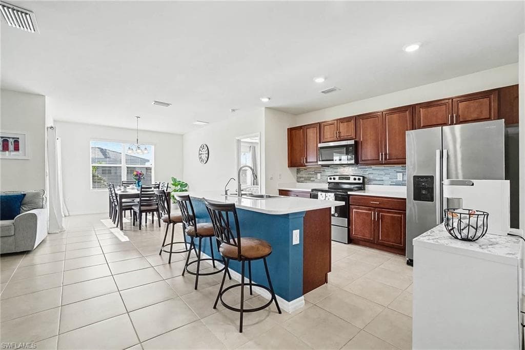 1813 NW 24th PL CAPE CORAL, FL 33993