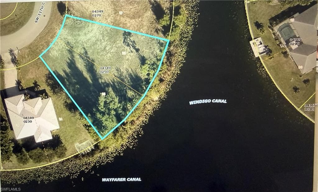 1433 11th CT CAPE CORAL, FL 33991