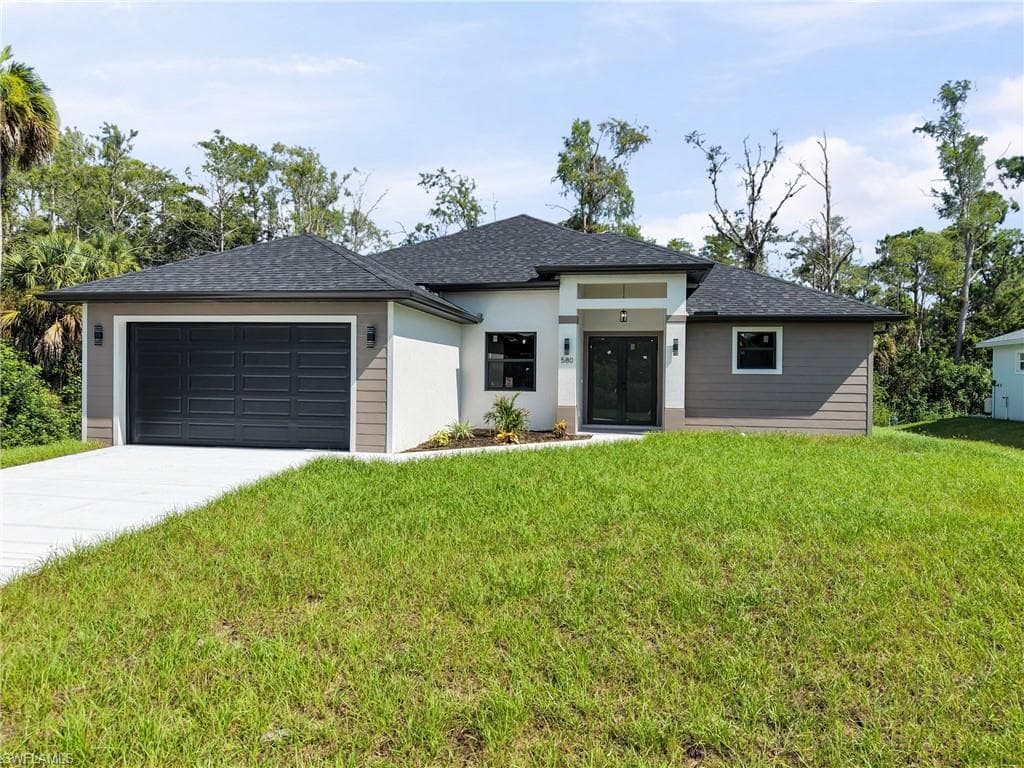 580 WOODVIEW DR LEHIGH ACRES, FL 33972