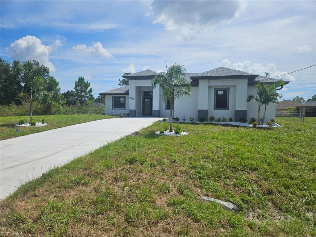 1102 Poinsettia AVE LEHIGH ACRES, FL 33972