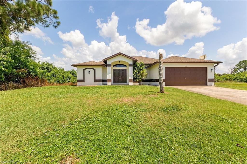 691 Manhattan ST E LEHIGH ACRES, FL 33974