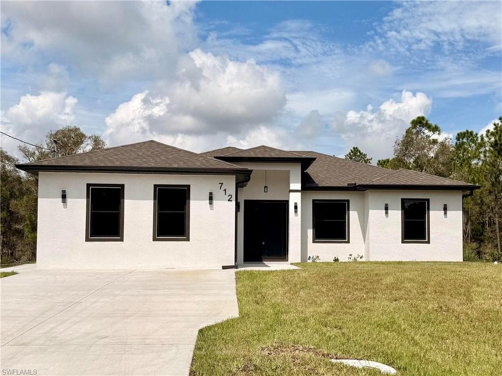 712 Gaylord AVE S LEHIGH ACRES, FL 33974
