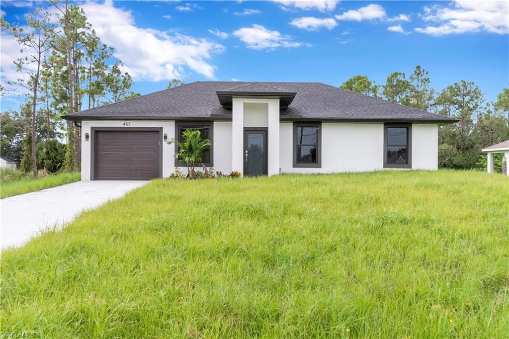 457 Woodman DR LEHIGH ACRES, FL 33972