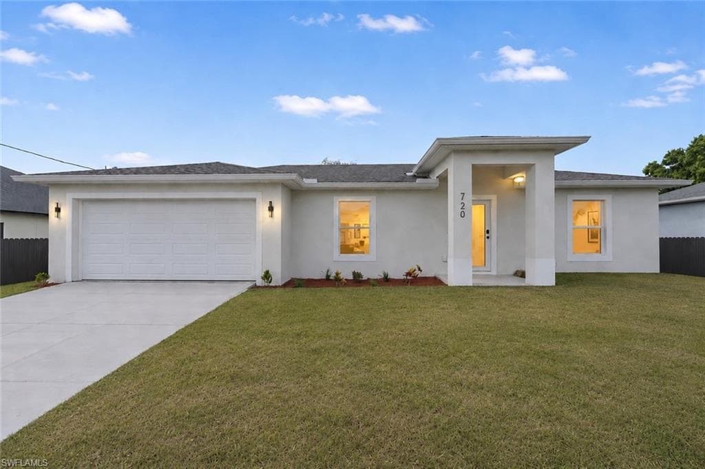 720 Grant BLVD LEHIGH ACRES, FL 33974