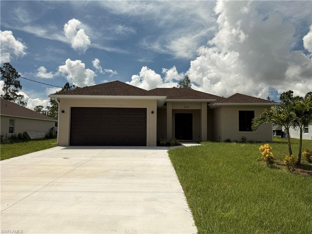 469 Woodman DR LEHIGH ACRES, FL 33972