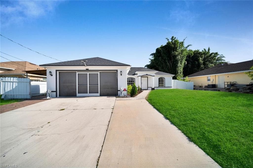 3203 36th ST SW LEHIGH ACRES, FL 33976