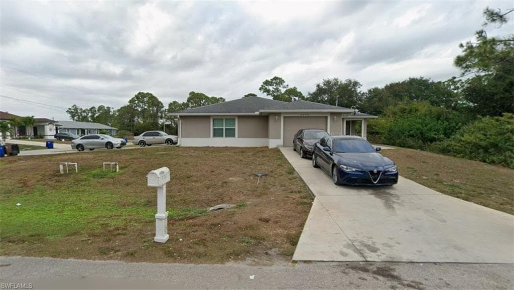 2430 Mansfield AVE S LEHIGH ACRES, FL 33973
