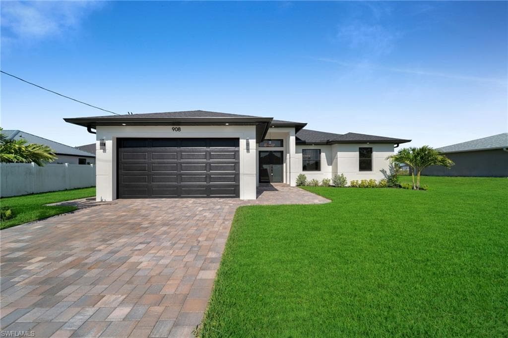 908 NE 11th AVE CAPE CORAL, FL 33909