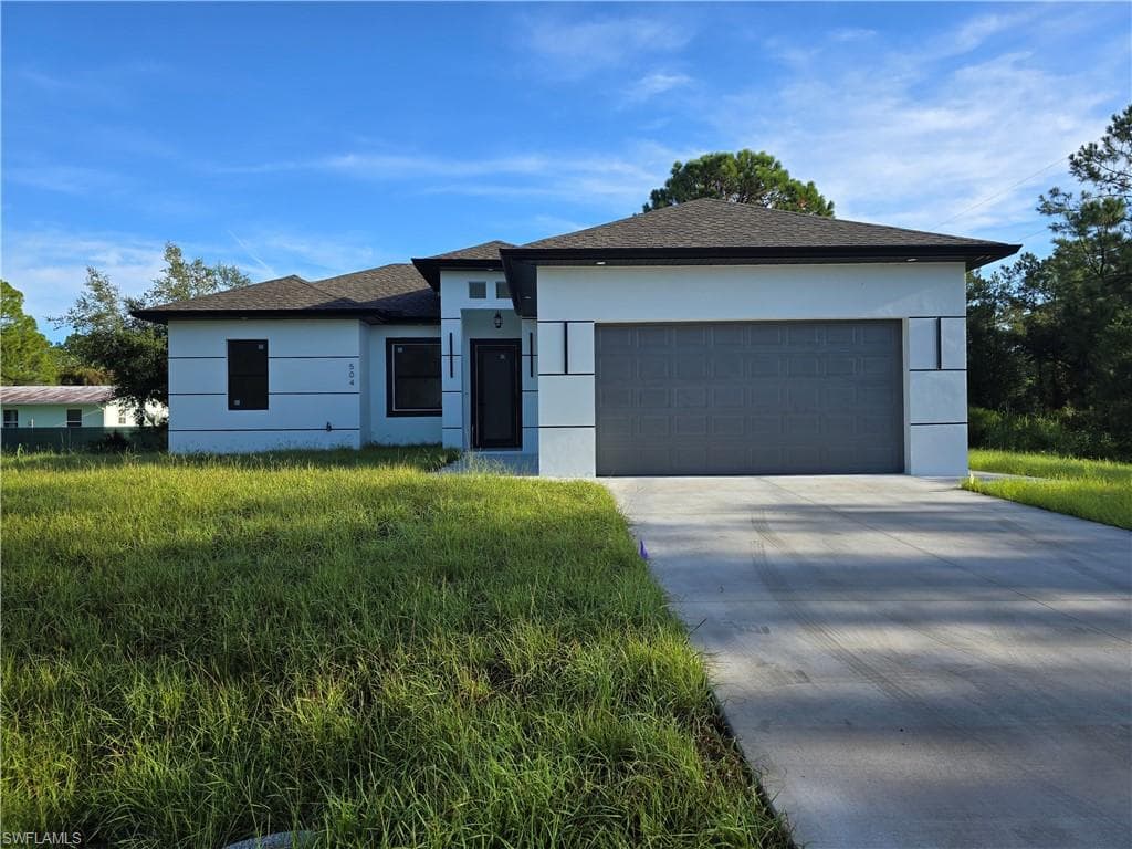 504 W 11th ST LEHIGH ACRES, FL 33972